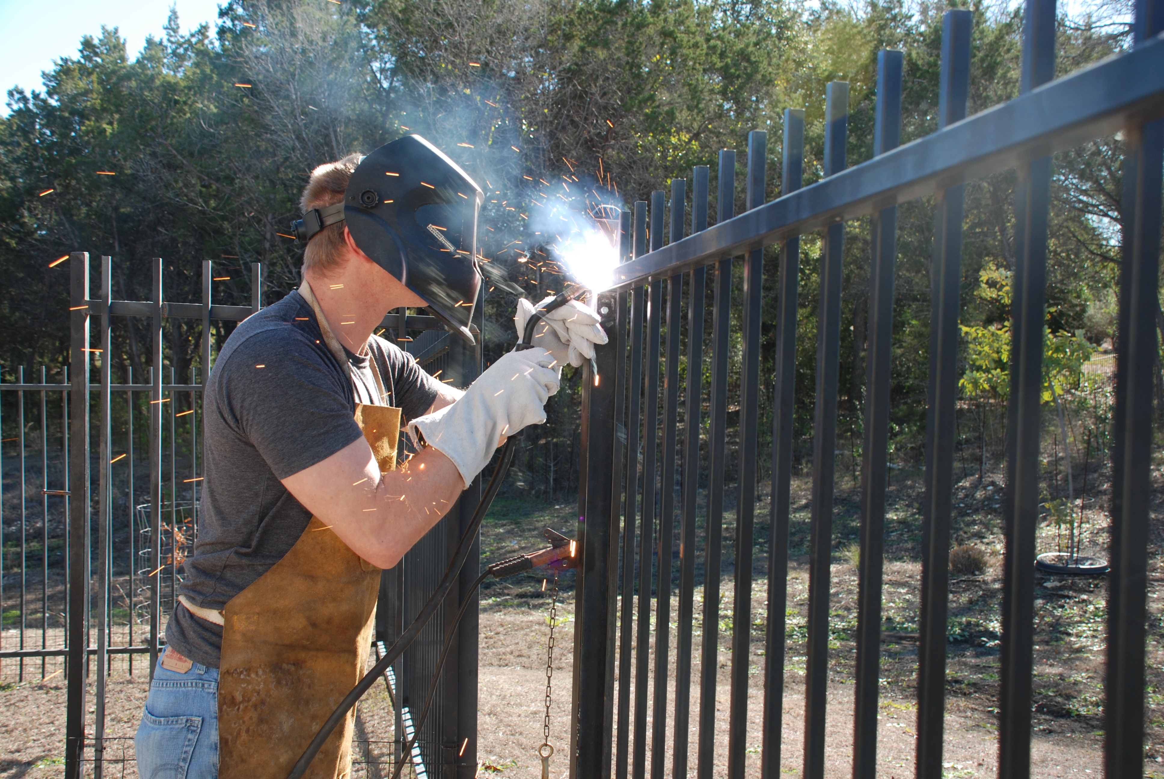 2011-12-30-Justin welds our fence-05.jpg